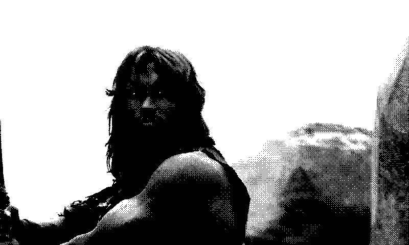 A 1-bit black and white image of Conan the Barbarian. The dithering on the image has caused Conan's eyes to be rendered as 1px white dots.